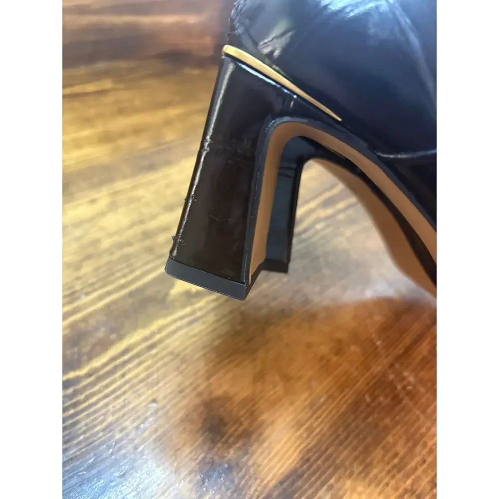Vince Camuto black pointed toe heeled booties size 5.5